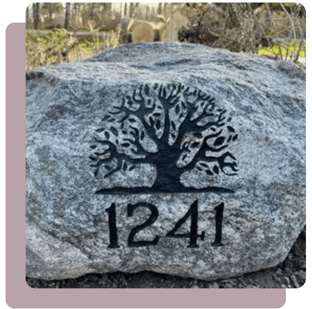 A rock with the number 1 2 4 1 carved into it.