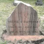 A grave marker for louise fletcher in the cemetery.
