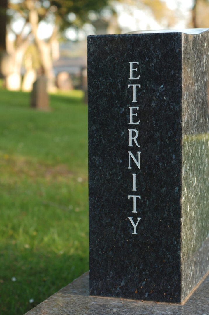 A black sign with the word eternity on it.